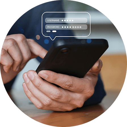 A person logging in on a smartphone, showing username and password fields.